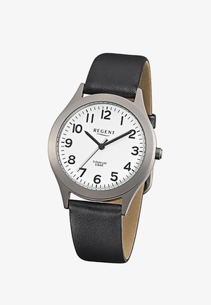 Montre analogique avec cadran blanc, chiffres noirs, bracelet en cuir noir et boîtier en titane argenté affichant l'heure 10:10:36.