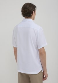 Calliope TINTA UNITA  - Polo - bianco