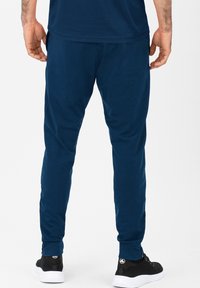 JAKO CLASSICO - Tracksuit bottoms - blauweiss