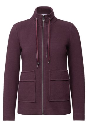 Burgundy zip-up jacket with a high collar, two front pockets, drawstring at neck, and ribbed texture. Features silver-tone hardware.