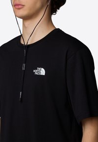 The North Face RELAXED MOUNTAIN SKETCH - T-shirt med print - tnf black