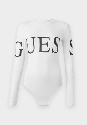 White long-sleeve bodysuit with black "GUESS" print across the front and sleeves. Smooth, stretchy fabric with a fitted silhouette.