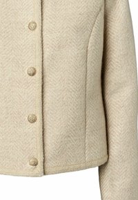 Veste tissée beige clair avec un motif en chevrons texturé, dotée de boutons dorés et d'un design court, avec des bords soigneusement finis.