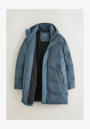 Puffy Thermojacke in dunklem Teal, ausgestattet mit Kapuze, Frontreißverschluss, Druckknöpfen und zwei Seitentaschen. Gefüttert mit schwarzem Fleece-Innenfutter.