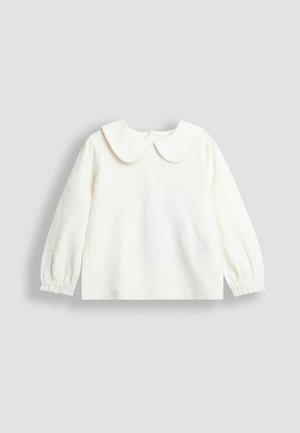 Langærmet hvid bluse med omkringliggende krave, elastiske manchetter og en blød stoftekstur. Enkelt, minimalistisk design uden mønstre.
