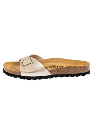 Sandalo infradito singolo in pelle beige con fibbia regolabile, soletta in sughero, suola in gomma nera testurizzata e sottopiede in suede color cuoio con la scritta "Palada".