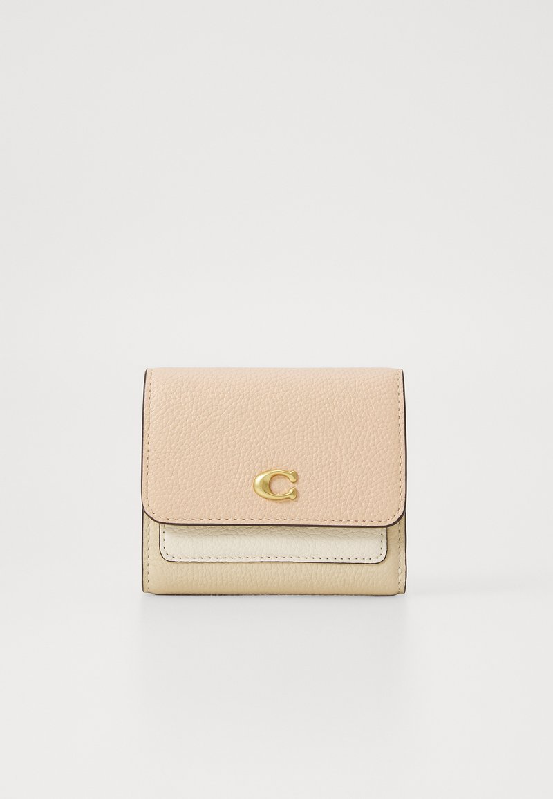 Pink and cream leather wallet with textured surface, gold hardware, and a front flap featuring a logo. Compact rectangular shape.