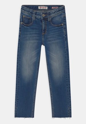 Dark blue denim jeans with a straight cut, five pockets, light fading, and raw hems at the ankles. Features branded tags and metal button closure.