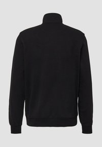 Czarna bluza z wysokim kołnierzem, długimi rękawami oraz elastycznymi mankietami i dołem. Wykonana z miękkiego materiału o gładkiej fakturze.
