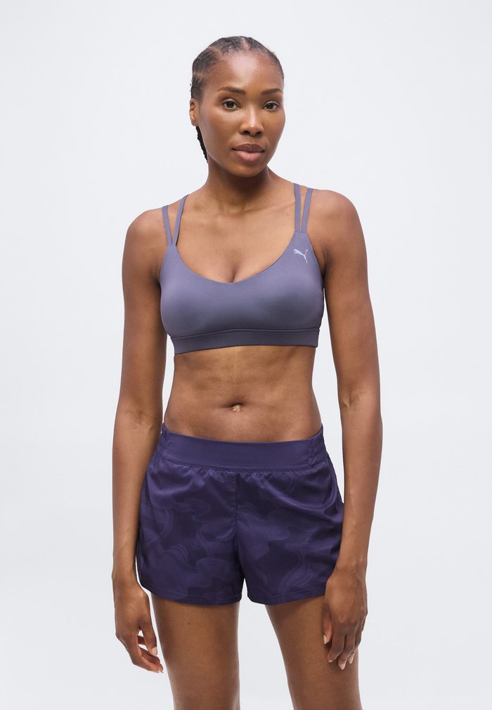 PUMA SHAPE BRA LOW - Light support sports bra - inky depths