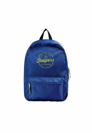 Mochila de nylon azul con forma redondeada. Presenta un bolsillo frontal con cremallera y una cremallera verde en contraste. Texto del logo impreso en el frente.