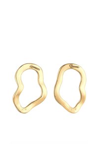 Goldfarbene Metallohrringe mit einer unregelmäßigen, wellenförmigen Gestalt. Sie besitzen eine glatte Textur und ein kleines Zeichen "925", das auf Sterlingsilber hinweist.