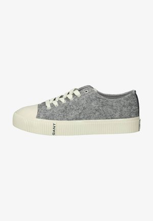 Gray textile sneaker with white rubber sole, round toe, and white laces; features logo on the side and textured pattern on the body.