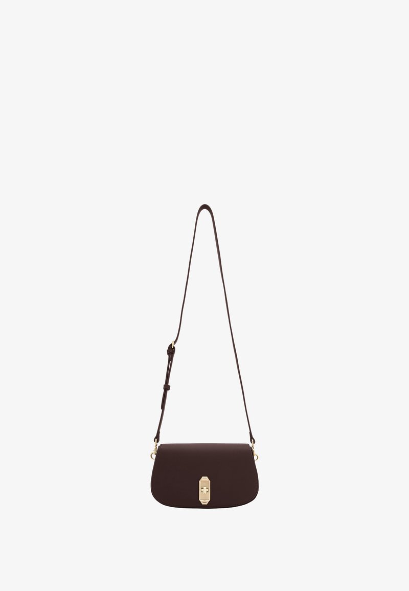 Brown leather crossbody bag with a curved shape, gold hardware, and an adjustable strap. Features a flap closure with a rectangular clasp.