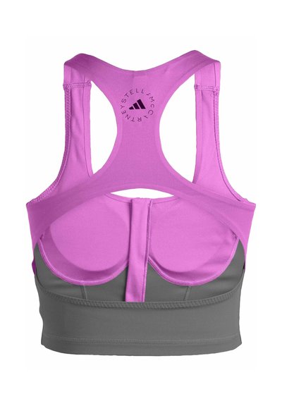 Pink and gray sports bra with a racerback design, featuring a mesh material, molded cups, and logo detail on the back.