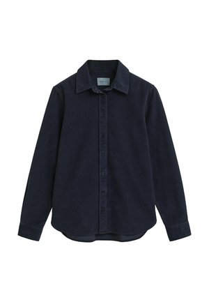 Dark navy blue corduroy long-sleeve button-up shirt with collar and rounded hem displayed on a white background.