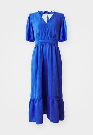 Kék pamutruha rövid puffos ujjakkal, kulcslyuk kivágással és lépcsős szoknyával. Az anyag texturált felületű.