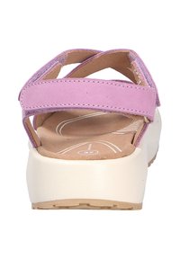Women's size 37 sandal with pink adjustable straps and cushioned beige sole, viewed from the heel on a white background.