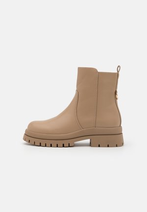 Bottines à plateau - beige