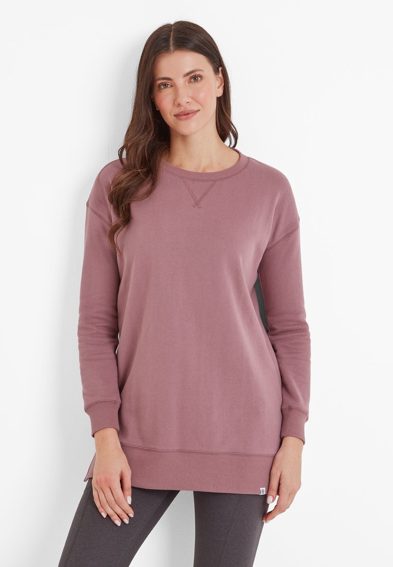 Long-sleeve pullover in muted mauve, made of soft fabric with ribbed cuffs and hem, featuring a crew neck and side slits for ease of movement.