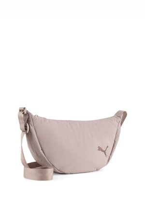 Light pink nylon shoulder bag with a curved shape, adjustable strap, and a small embroidered logo. Smooth texture with a minimalist design.