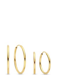 Boucles d'oreilles créoles en or disponibles en trois tailles, présentant une finition lisse et polie avec un design de fermoir sans couture. Forme circulaire solide sans embellissements.