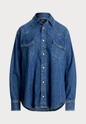 Mørkeblå denimskjorte med spiss krage, trykknapper, to brystlommer og vestlig stil på yook-sømmene. Lange ermer med knappelukking.