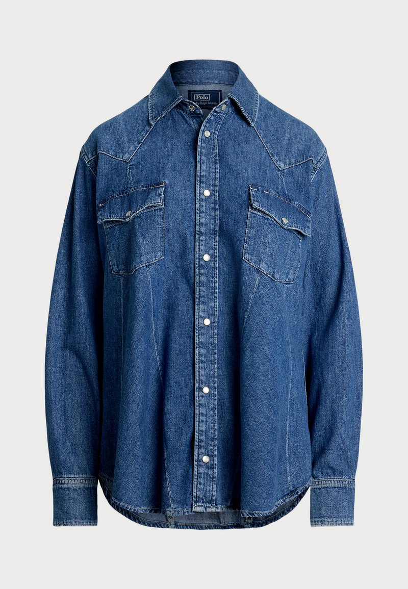 Mørkeblå denimskjorte med spiss krage, trykknapper, to brystlommer og vestlig stil på yook-sømmene. Lange ermer med knappelukking.