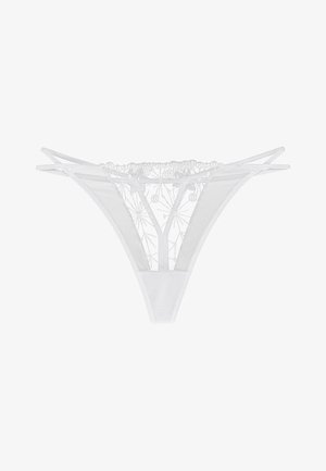 White thong with floral embroidery, sheer mesh panels, and double strap design. Features a textured waistband with decorative details.