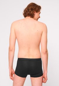 Sloggi 4-PACK - Široké boxerky - black