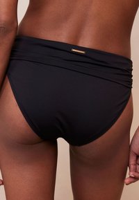 Mint Velvet MINT VELVET ROLL TOP BLACK BIKINI BRIEFS - Bikinio apatinė dalis - black