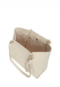 Borsa a mano in pelle beige con manici in corda, apertura superiore e tasca interna con zip. Tessuto liscio con una forma rettangolare strutturata.