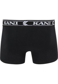 Fekete boxeralsó, puha anyagból készült, széles elasztikus derékpánttal, amelyen fehér "KANI" logó és kontrasztcsíkok találhatók.