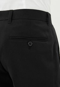 Next SKINNY FIT PLAIN FRONT - Bukser - black