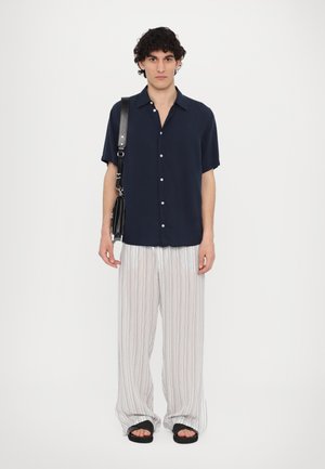ROBERTA PANTS UNISEX - Pantalon classique - black