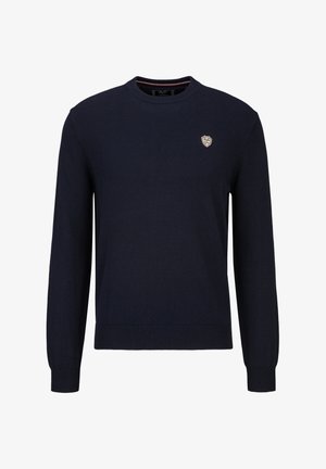 Marineblauwe gebreide trui met lange mouwen, ronde hals, geribbelde manchetten en zoom. Voorzien van een klein logopatch op de borst.