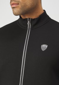 EA7 Emporio Armani TRAIN PREMIUSHIELD TRACK SUIT - Trenirka - black