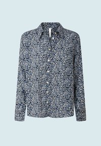 Langærmet skjorte med knaplukning med et blåt og hvidt blomstermønster på en lys baggrund, der har en klassisk krave.