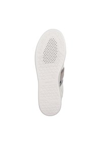Shoe sole featuring a white rubber material with textured grip patterns and perforations for breathability. Notable logo branding visible.