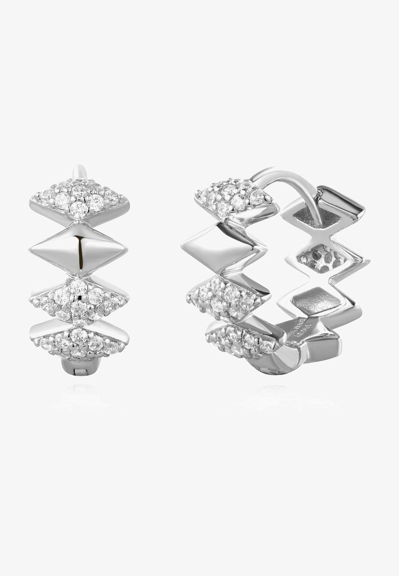 Silverfärgade hoopörhängen med zigzagdesign, prydda med diamantliknande detaljer på växelvisa former, med en polerad finish och en säker låsning.