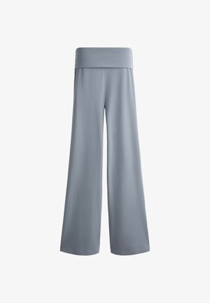 Wide-leg pants in a soft gray fabric with a high, smooth waistband, designed for comfort and flow.