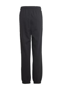 Pantalones de chándal negros hechos de una tela suave, con una cinturilla elástica y puños en los tobillos ajustados para un ajuste cómodo. Sin patrones visibles.