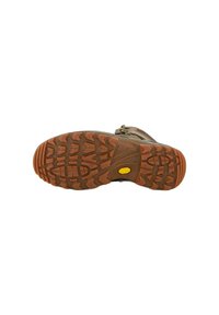Suola di scarpa da trekking marrone con motivo di battistrada profondo. Logo Vibram in giallo. Materiale in gomma resistente per trazione su superfici varie.