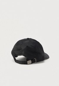 Black adjustable baseball cap with metal buckle clasp, displayed from the back on a plain light background.