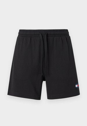 Short noir à cordon avec taille élastique et petit logo Tommy Hilfiger sur la partie inférieure de la jambe gauche.