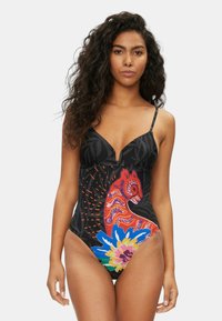 Zwart zwemkleding met kleurrijke bloemen- en dierenprints, voorzien van verstelbare spaghettibandjes en een v-halsontwerp. Zachte structuur.