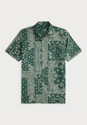 Groen overhemd met korte mouwen en knopen, met een wit paisley en bandana patchwork patroon en een enkele borstzak.