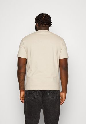 Camiseta estampada - beige