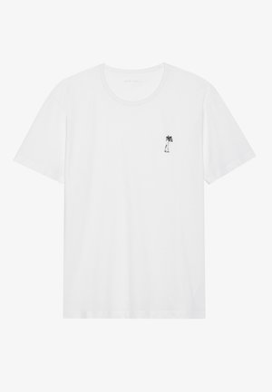 Camiseta blanca de algodón con mangas cortas y cuello redondo; presenta un pequeño gráfico de una palmera negra en el lado izquierdo del pecho.