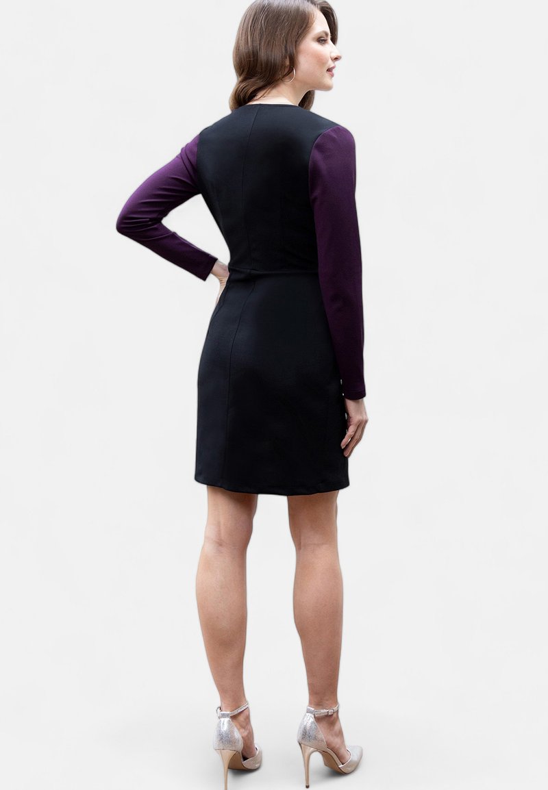 black dress with white ruffle TULLE RUFFLE CIRCLE MINI DRESS – Viktor&Rolf main image 1